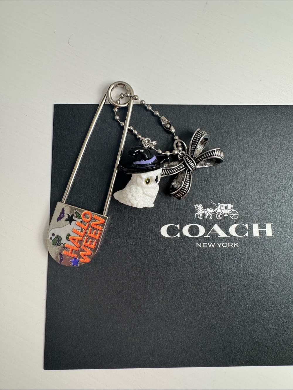 Coach bow charm with customized big safety pin and little owl cluster keychain